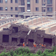 Illustration for article titled Entire New 13-Story Building Tips Over in Shanghai